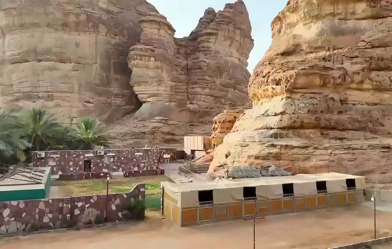 Stables at the foot of the cliff